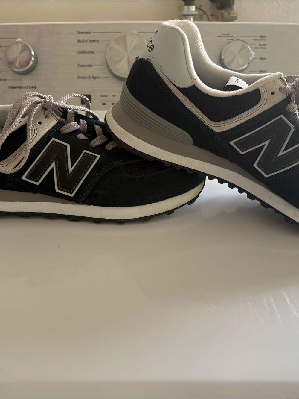 New Balance women’s Classic Black & Gray Sneakers